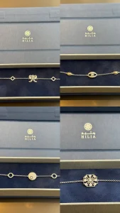 Necklaces different models in their jewelry boxes grey blue very elegant and prestigious for women. Brand HILIA...